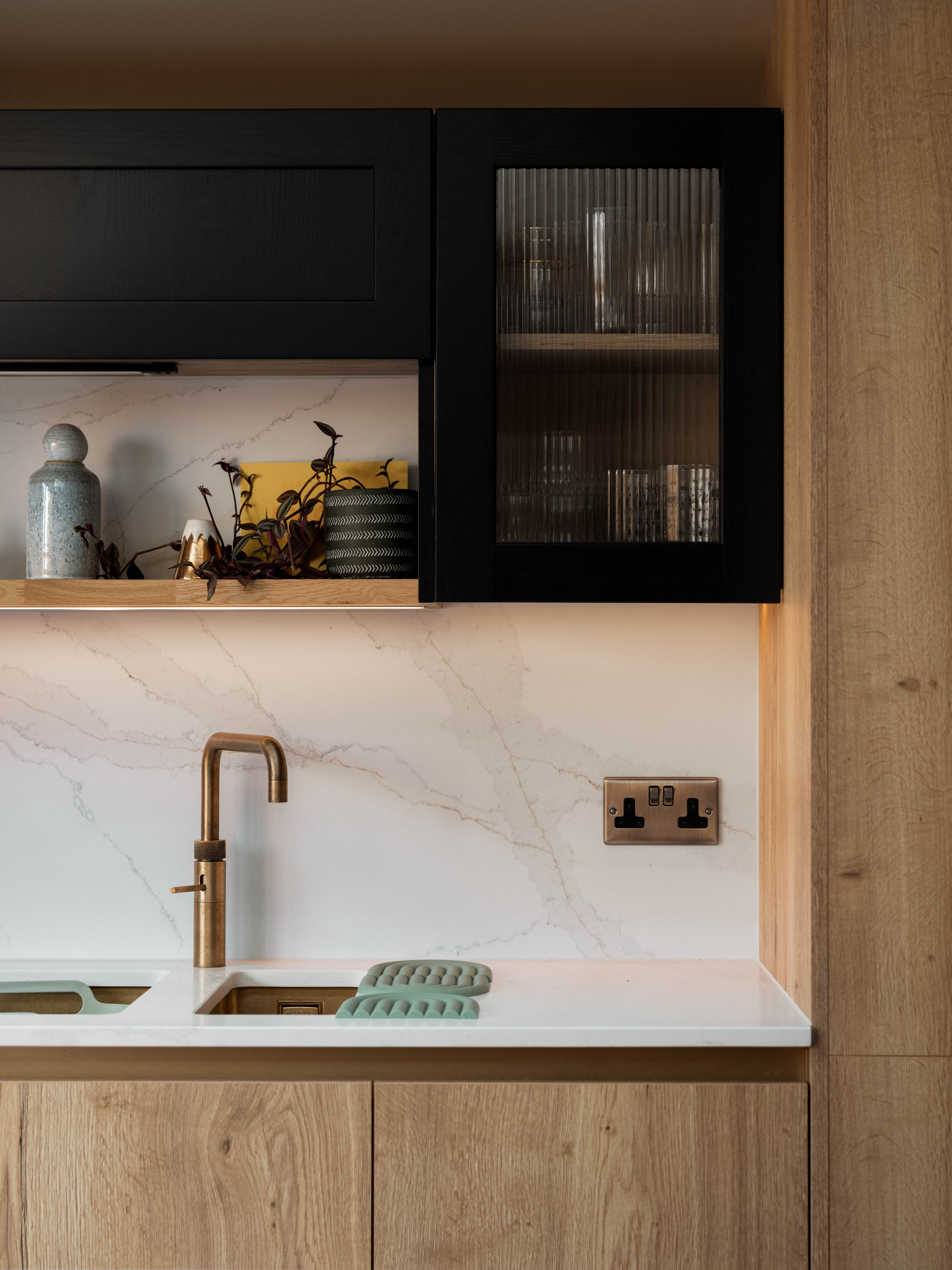 Oak kitchen joinery and sink detail at Ewhurst Road
