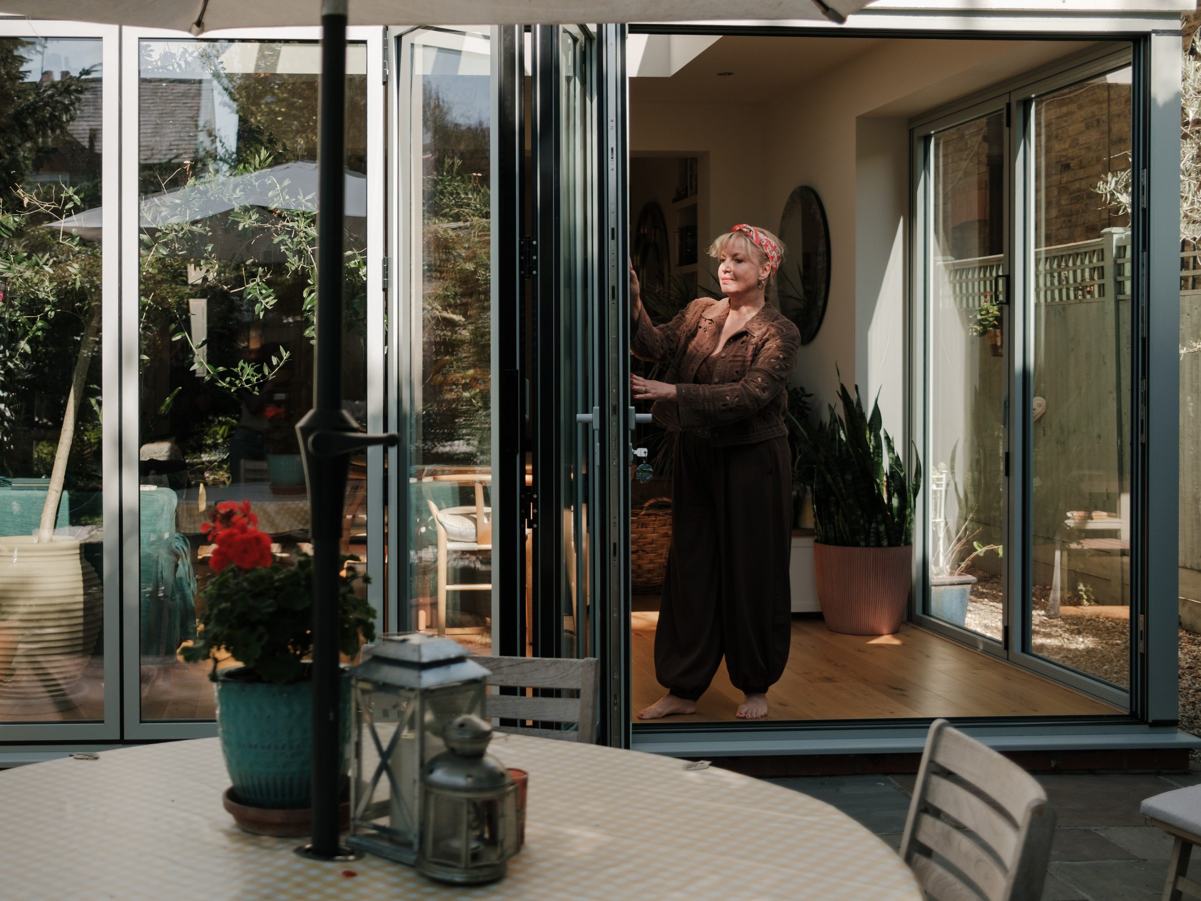 Looking in from the garden as the doors are opened