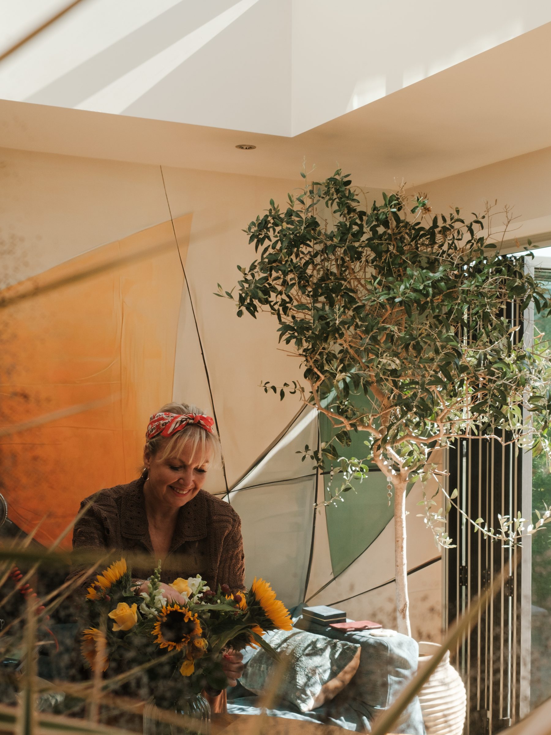 The owner inside the extension beneath the roof light
