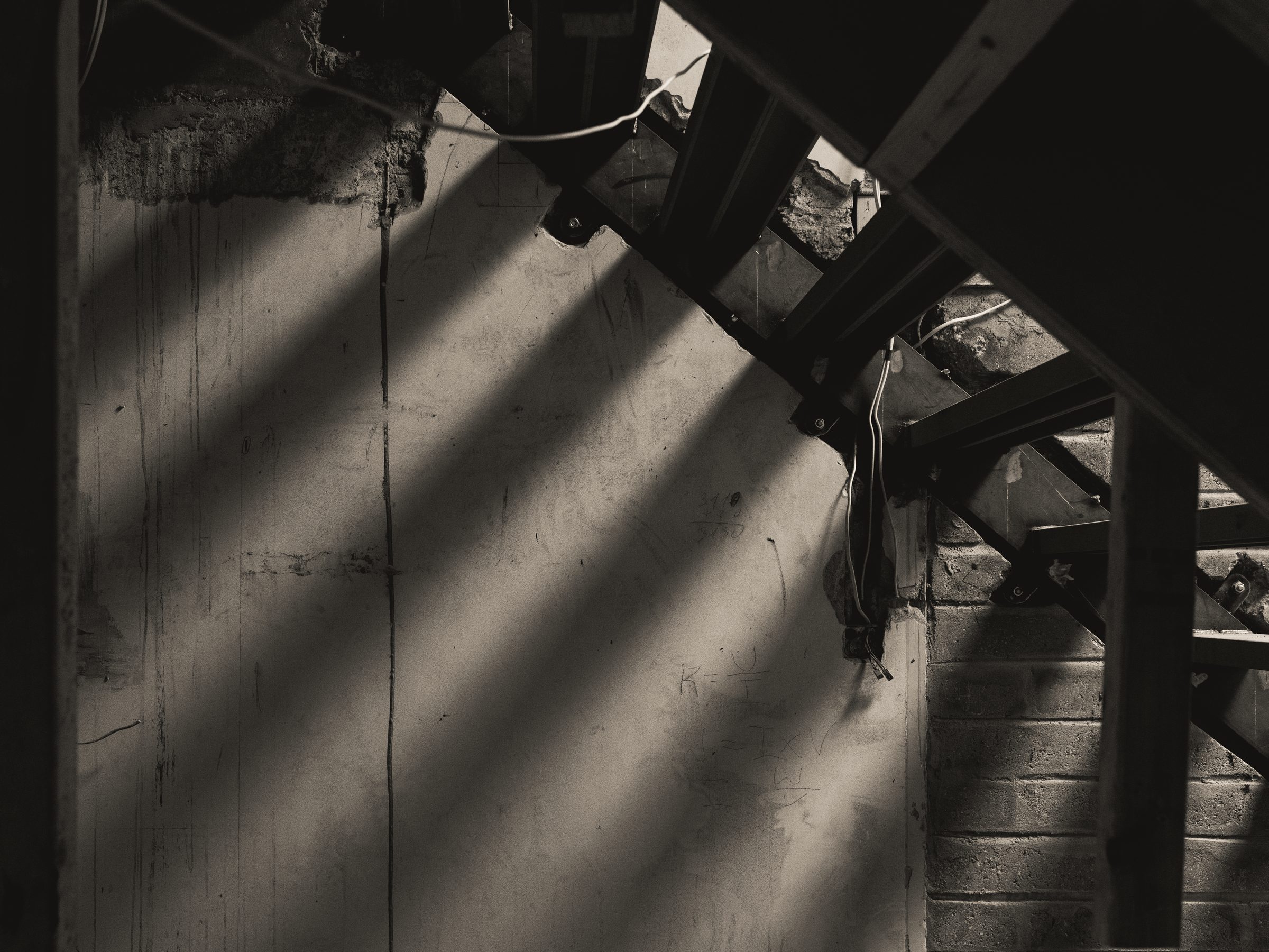 Light and shadow across the stair structure